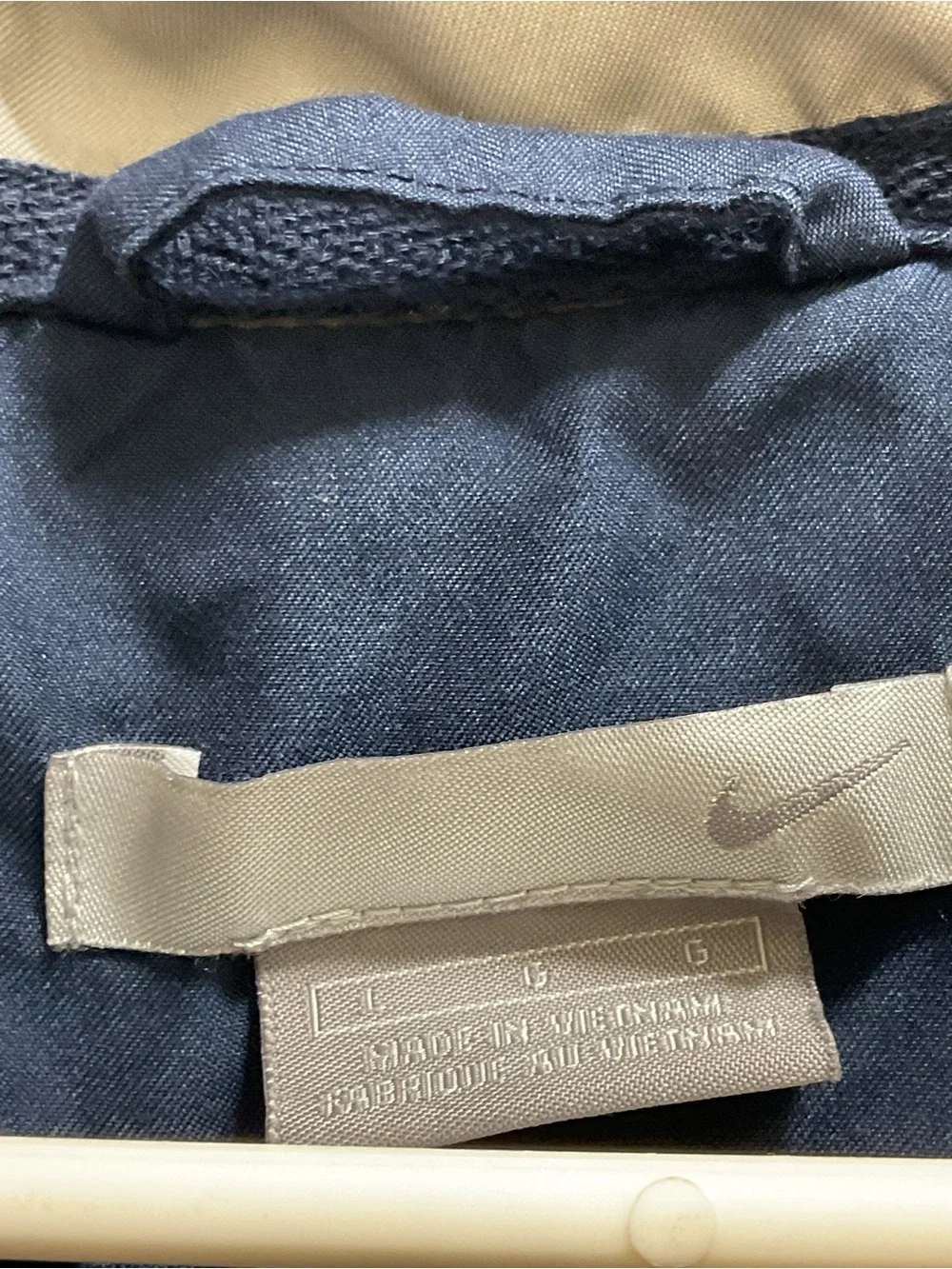 Vintage Nike Men’s Navy Blue Windbreaker with White Chest Stripe
